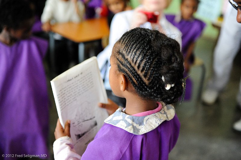 20120327_102723 Nikon D3S (1) 2x3.jpg - Reading a story in Amharic